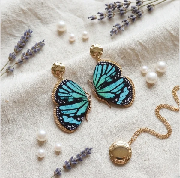Elegant drop earrings from Passionate Bangladesh, lightweight dangle design for women and girls, perfect for parties and special occasions. Try our different designs like butterfly earrings, long chain earrings, heart shape earrings and stone earrings.