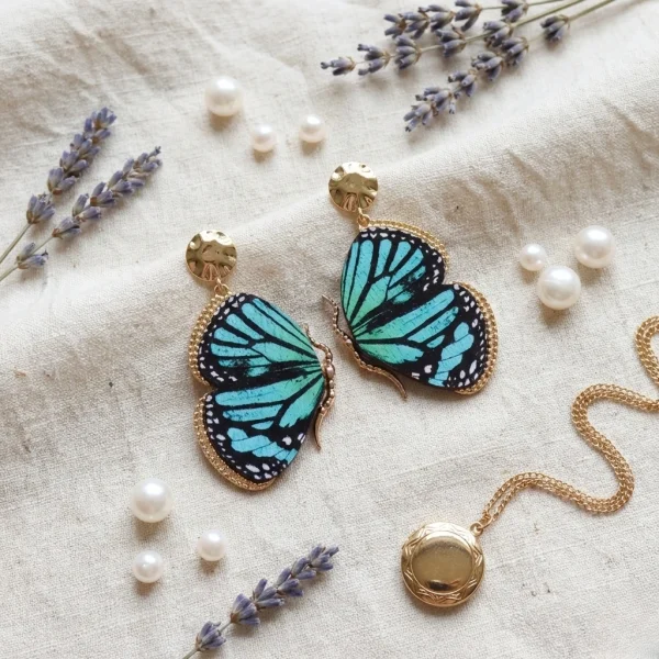 Elegant drop earrings from Passionate Bangladesh, lightweight dangle design for women and girls, perfect for parties and special occasions. Try our different designs like butterfly earrings, long chain earrings, heart shape earrings and stone earrings.