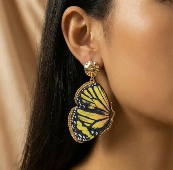 Elegant drop earrings from Passionate Bangladesh, lightweight dangle design for women and girls, perfect for parties and special occasions. Try our different designs like butterfly earrings, long chain earrings, heart shape earrings and stone earrings.