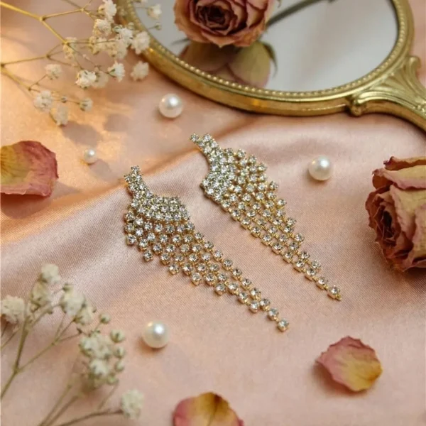 Elegant drop earrings from Passionate Bangladesh, lightweight dangle design for women and girls, perfect for parties and special occasions. Try our different designs like butterfly earrings, long chain earrings, heart shape earrings and stone earrings.