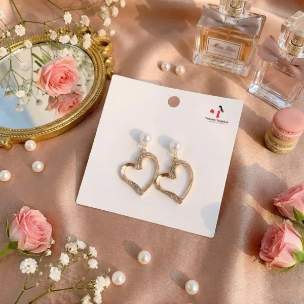 Elegant drop earrings from Passionate Bangladesh, lightweight dangle design for women and girls, perfect for parties and special occasions. Try our different designs like butterfly earrings, long chain earrings, heart shape earrings and stone earrings.