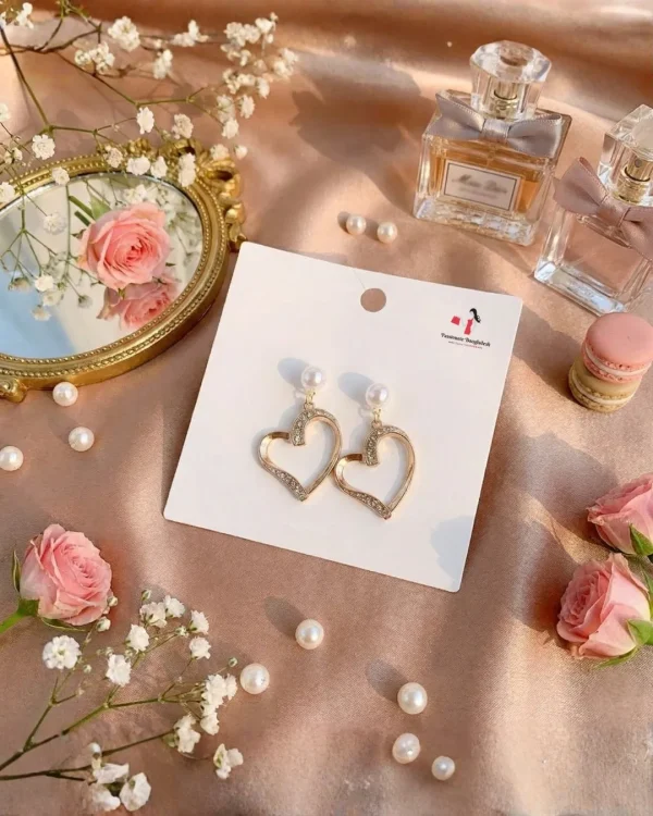 Elegant drop earrings from Passionate Bangladesh, lightweight dangle design for women and girls, perfect for parties and special occasions. Try our different designs like butterfly earrings, long chain earrings, heart shape earrings and stone earrings.