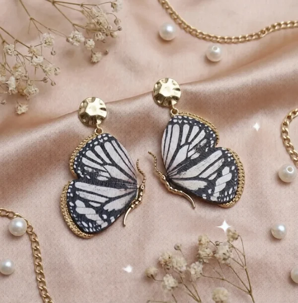 Elegant drop earrings from Passionate Bangladesh, lightweight dangle design for women and girls, perfect for parties and special occasions. Try our different designs like butterfly earrings, long chain earrings, heart shape earrings and stone earrings.