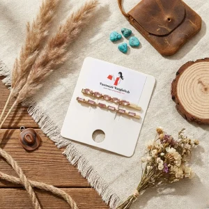 Elegant hair clips from Passionate Bangladesh, lightweight dangle design for women and girls, perfect for parties and special occasions. Try our different designs and colors like pink clips, white ball-print clips etc.