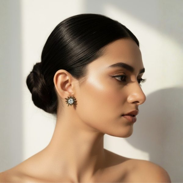 Stud earring set from Passionate Bangladesh, featuring multiple pairs of small everyday studs in different shapes and colors, budget friendly, attractive earrings and arranged on a display card.