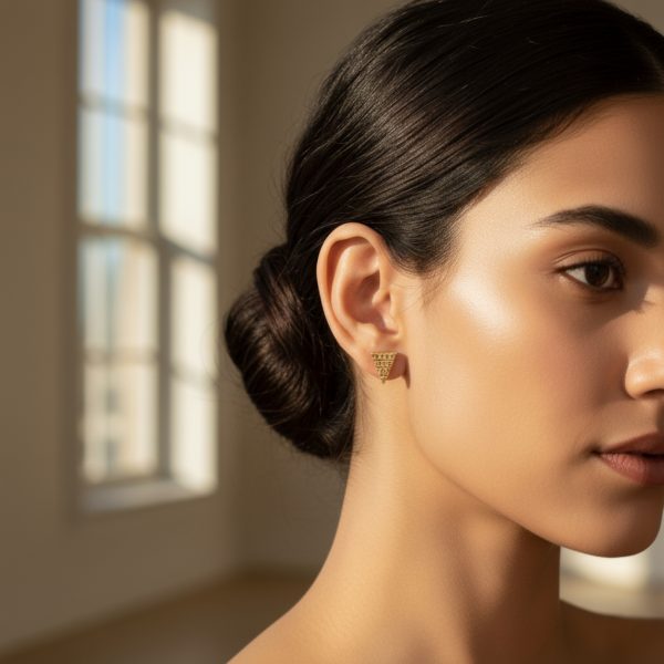 Stud earring set from Passionate Bangladesh, featuring multiple pairs of small everyday studs in different shapes and colors, budget friendly, attractive earrings and arranged on a display card.