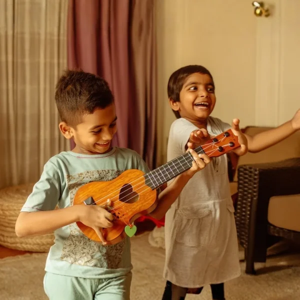 17-inch acoustic toy guitar for children available at Passionate Bangladesh.