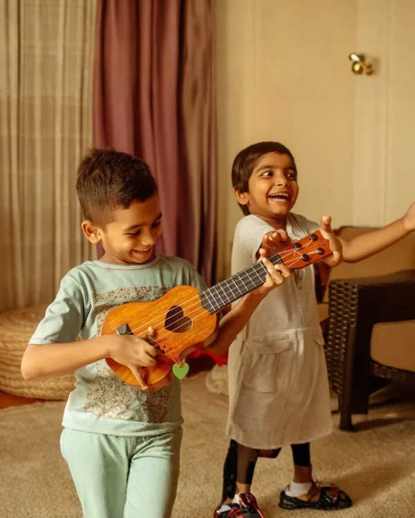 17-inch acoustic toy guitar for children available at Passionate Bangladesh.