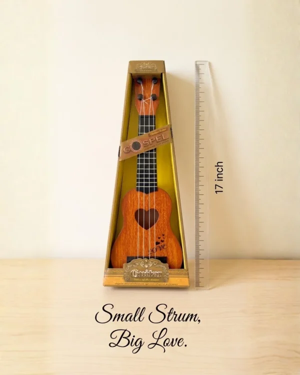 17-inch acoustic toy guitar for children available at Passionate Bangladesh.
