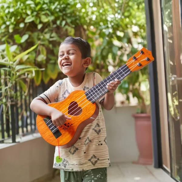 17-inch acoustic toy guitar for children available at Passionate Bangladesh.