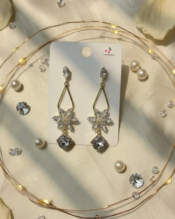 Elegant drop earrings from Passionate Bangladesh, lightweight dangle design for women and girls, perfect for parties and special occasions. Try our different designs like butterfly earrings, long chain earrings, heart shape earrings and stone earrings.
