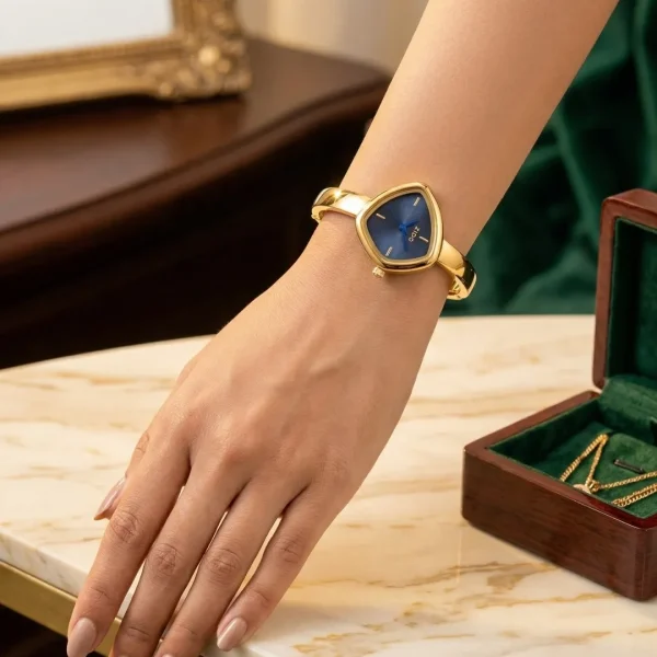 Shop golden triangle dial slim wrist watch for women. Elegant, lightweight, and stylish design perfect for daily wear, office, and parties. Limited Stocks !! https://passionatebangladesh.com/product-category/accessories/