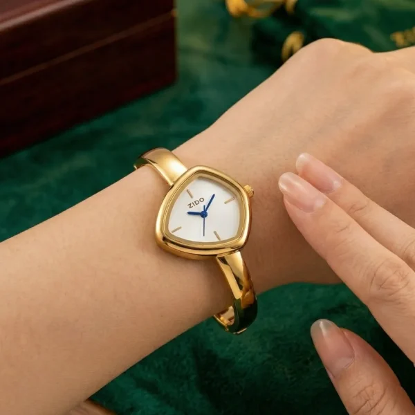 Shop slim golden wrist watch for women. Elegant, lightweight, and stylish design perfect for daily wear, office, and parties. Limited Stocks !! https://passionatebangladesh.com/product-category/accessories/