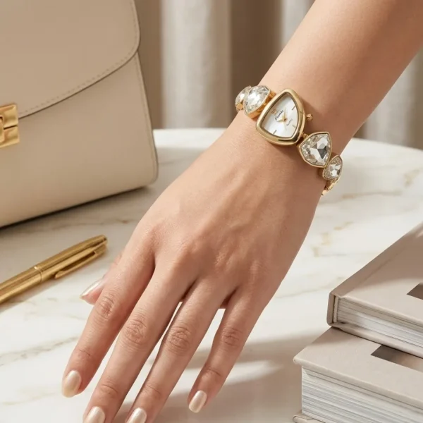 Shop crystal water/white colored stone golden wrist watch for women. Elegant, lightweight, and stylish design perfect for daily wear, office, and parties. Limited Stocks !! https://passionatebangladesh.com/product-category/accessories/