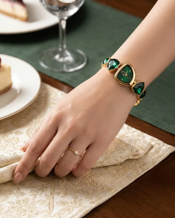 Shop green emerald color stone golden wrist watch for women. Elegant, lightweight, and stylish design perfect for daily wear, office, and parties. Limited Stocks !! https://passionatebangladesh.com/product-category/accessories/
