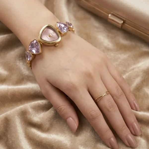 Shop Light purple stone golden wrist watch for women. Elegant, lightweight, and stylish design perfect for daily wear, office, and parties. Limited Stocks !! https://passionatebangladesh.com/product-category/accessories/