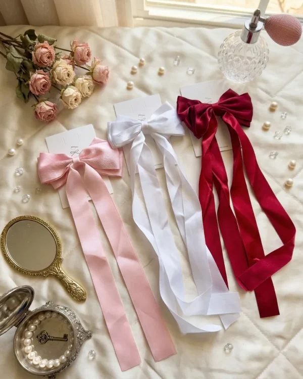 Cute hair accessories collection with multicolor bow clips, hair ribbons, hairbands and teddy bear or bunny hairbands for girls and kids from Passionate Bangladesh.