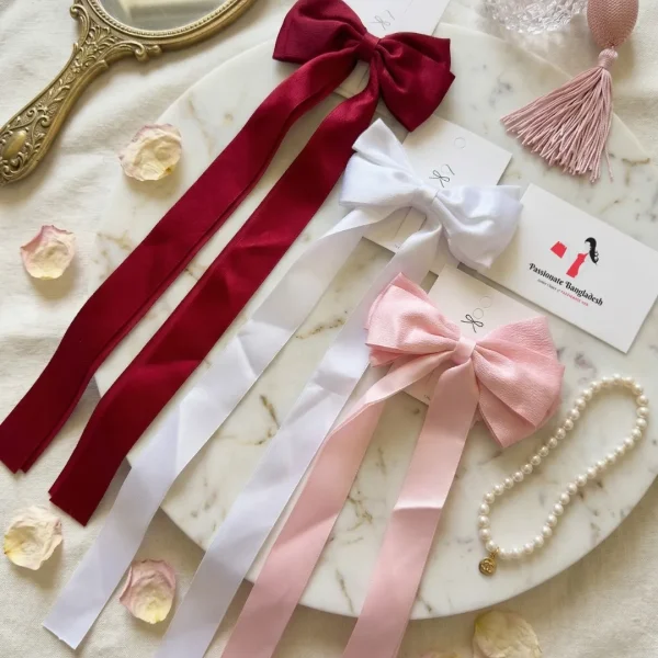 Cute hair accessories collection with multicolor bow clips, hair ribbons, hairbands and teddy bear or bunny hairbands for girls and kids from Passionate Bangladesh.