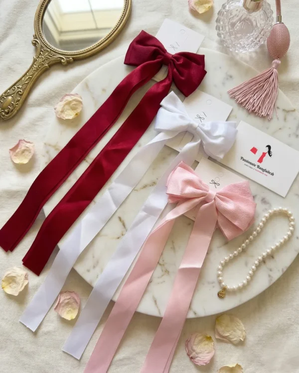 Cute hair accessories collection with multicolor bow clips, hair ribbons, hairbands and teddy bear or bunny hairbands for girls and kids from Passionate Bangladesh.
