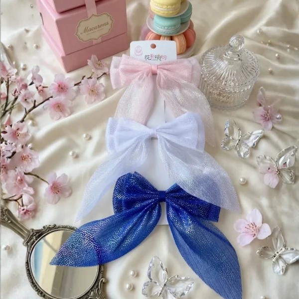 Cute hair accessories collection with multicolor bow clips, hair ribbons, hairbands and teddy bear or bunny hairbands for girls and kids from Passionate Bangladesh.