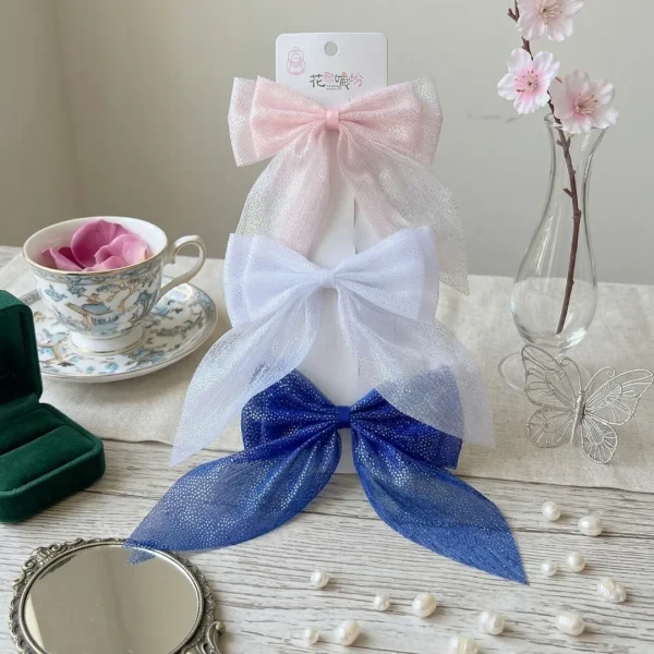 Cute hair accessories collection with multicolor bow clips, hair ribbons, hairbands and teddy bear or bunny hairbands for girls and kids from Passionate Bangladesh.