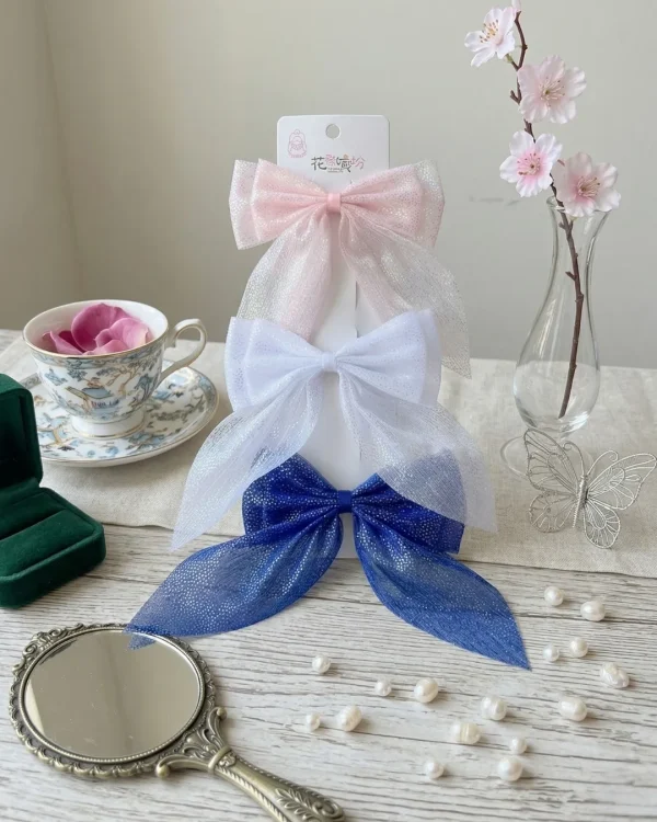 Cute hair accessories collection with multicolor bow clips, hair ribbons, hairbands and teddy bear or bunny hairbands for girls and kids from Passionate Bangladesh.