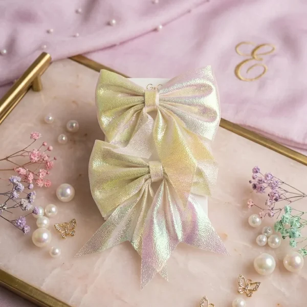 Cute hair accessories collection with multicolor bow clips, hair ribbons, hairbands and teddy bear or bunny hairbands for girls and kids from Passionate Bangladesh.