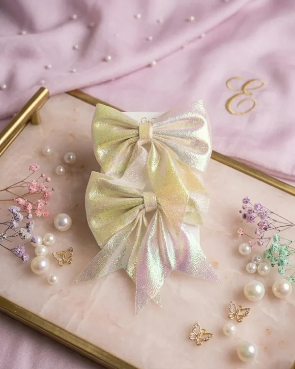 Cute hair accessories collection with multicolor bow clips, hair ribbons, hairbands and teddy bear or bunny hairbands for girls and kids from Passionate Bangladesh.