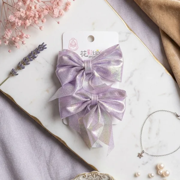 Cute hair accessories collection with multicolor bow clips, hair ribbons, hairbands and teddy bear or bunny hairbands for girls and kids from Passionate Bangladesh.