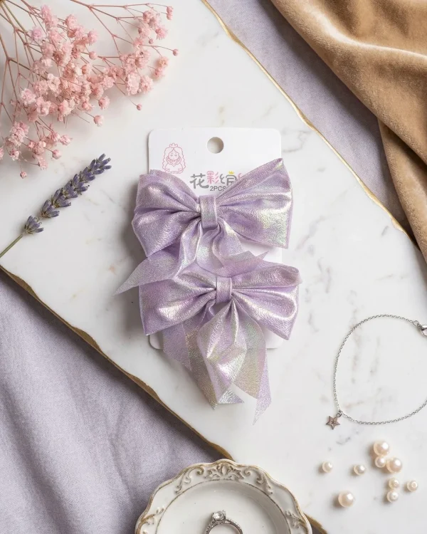 Cute hair accessories collection with multicolor bow clips, hair ribbons, hairbands and teddy bear or bunny hairbands for girls and kids from Passionate Bangladesh.