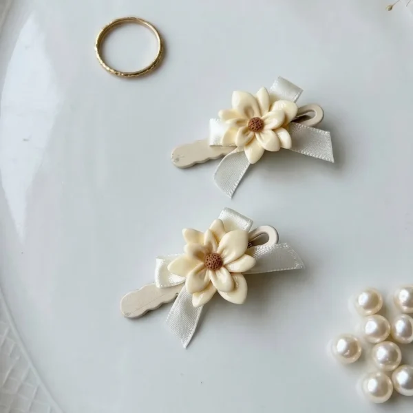 Cute hair accessories collection with multicolor bow clips, hair ribbons, hairbands and teddy bear or bunny hairbands for girls and kids from Passionate Bangladesh.