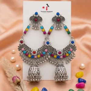 Traditional oxidized-style jhumka earrings with red, yellow and blue stones, perfect for saree, salwar and festive party looks from Passionate Bangladesh. Shop now at www.passionatebangladesh.com