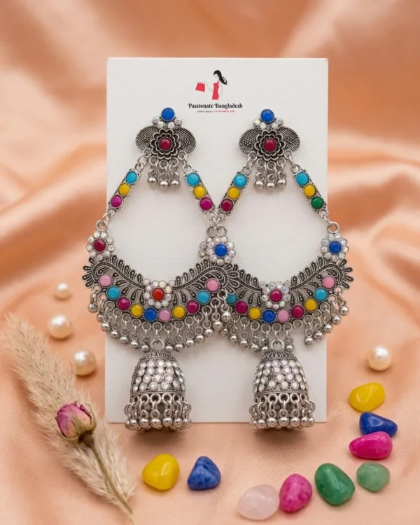 Traditional oxidized-style jhumka earrings with red, yellow and blue stones, perfect for saree, salwar and festive party looks from Passionate Bangladesh. Shop now at www.passionatebangladesh.com