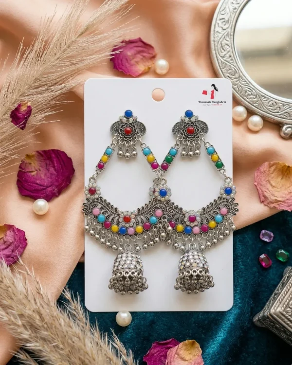 Traditional oxidized-style jhumka earrings with red, yellow and blue stones, perfect for saree, salwar and festive party looks from Passionate Bangladesh. Shop now at www.passionatebangladesh.com