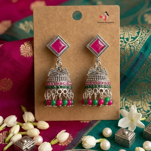 Traditional oxidized-style jhumka earrings with red, yellow and blue stones, perfect for saree, salwar and festive party looks from Passionate Bangladesh. Shop now at www.passionatebangladesh.com