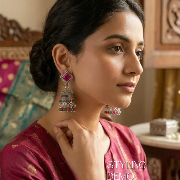 Traditional oxidized-style jhumka earrings with red, yellow and blue stones, perfect for saree, salwar and festive party looks from Passionate Bangladesh. Shop now at www.passionatebangladesh.com