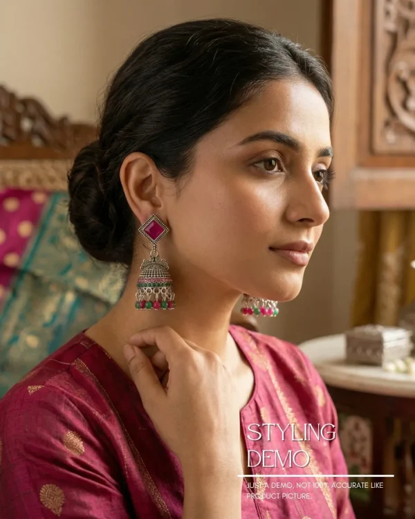 Traditional oxidized-style jhumka earrings with red, yellow and blue stones, perfect for saree, salwar and festive party looks from Passionate Bangladesh. Shop now at www.passionatebangladesh.com