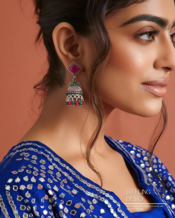 Traditional oxidized-style jhumka earrings with red, yellow and blue stones, perfect for saree, salwar and festive party looks from Passionate Bangladesh. Shop now at www.passionatebangladesh.com