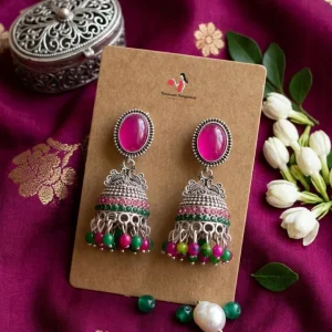 Traditional oxidized-style jhumka earrings with red, yellow and blue stones, perfect for saree, salwar and festive party looks from Passionate Bangladesh. Shop now at www.passionatebangladesh.com