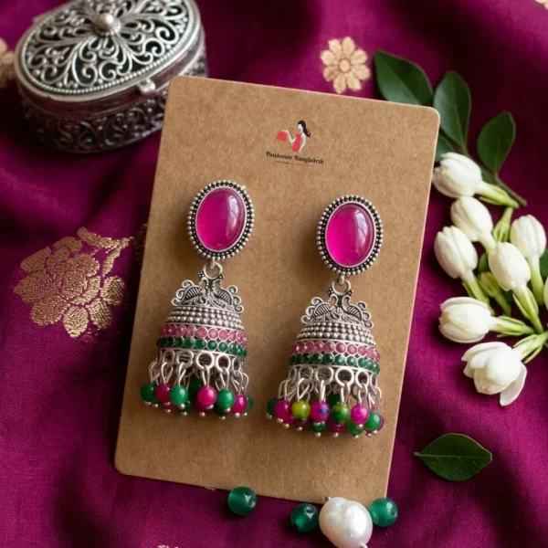 Traditional oxidized-style jhumka earrings with red, yellow and blue stones, perfect for saree, salwar and festive party looks from Passionate Bangladesh. Shop now at www.passionatebangladesh.com