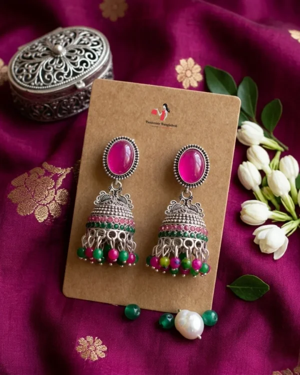 Traditional oxidized-style jhumka earrings with red, yellow and blue stones, perfect for saree, salwar and festive party looks from Passionate Bangladesh. Shop now at www.passionatebangladesh.com