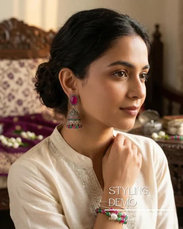 Traditional oxidized-style jhumka earrings with red, yellow and blue stones, perfect for saree, salwar and festive party looks from Passionate Bangladesh. Shop now at www.passionatebangladesh.com