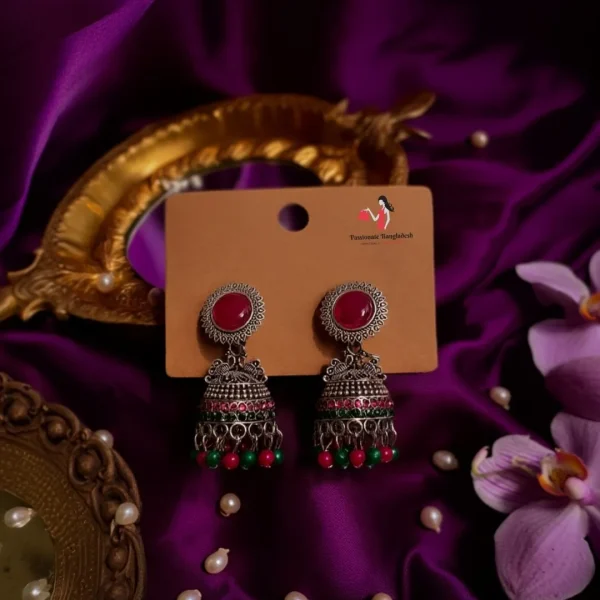 Traditional oxidized-style jhumka earrings with red, yellow and blue stones, perfect for saree, salwar and festive party looks from Passionate Bangladesh. Shop now at www.passionatebangladesh.com