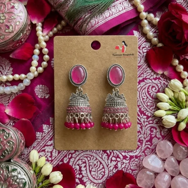 Traditional oxidized-style jhumka earrings with red, yellow and blue stones, perfect for saree, salwar and festive party looks from Passionate Bangladesh. Shop now at www.passionatebangladesh.com