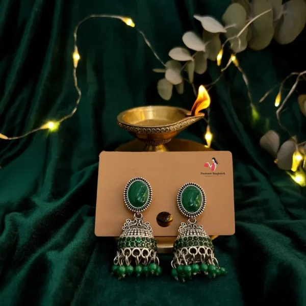 Traditional oxidized-style jhumka earrings with red, yellow and blue stones, perfect for saree, salwar and festive party looks from Passionate Bangladesh. Shop now at www.passionatebangladesh.com