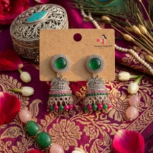 Traditional oxidized-style jhumka earrings with red, yellow and blue stones, perfect for saree, salwar and festive party looks from Passionate Bangladesh. Shop now at www.passionatebangladesh.com