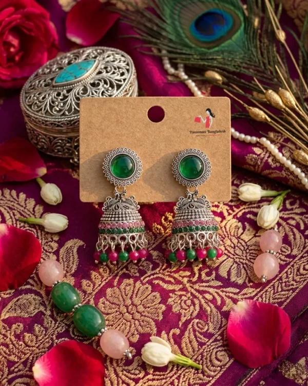 Traditional oxidized-style jhumka earrings with red, yellow and blue stones, perfect for saree, salwar and festive party looks from Passionate Bangladesh. Shop now at www.passionatebangladesh.com
