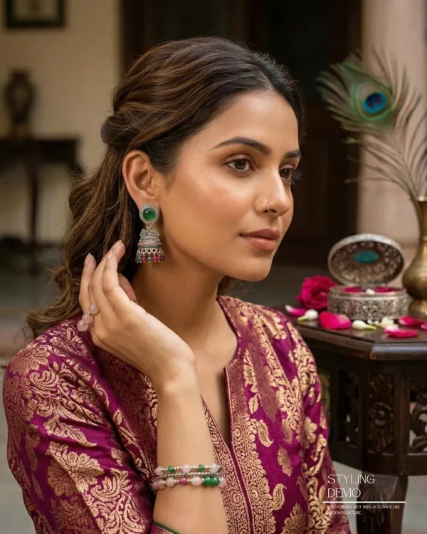 Traditional oxidized-style jhumka earrings with red, yellow and blue stones, perfect for saree, salwar and festive party looks from Passionate Bangladesh. Shop now at www.passionatebangladesh.com