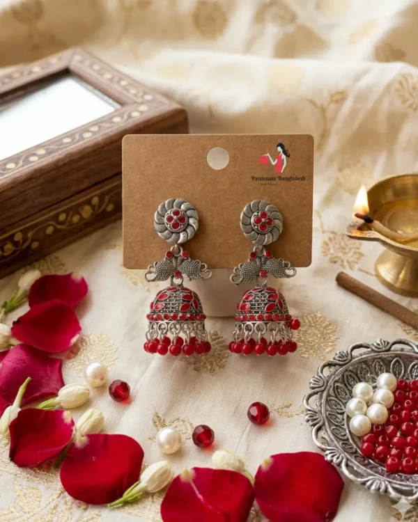 Traditional oxidized-style jhumka earrings with red, yellow and blue stones, perfect for saree, salwar and festive party looks from Passionate Bangladesh. Shop now at www.passionatebangladesh.com