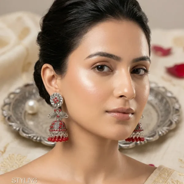 Traditional oxidized-style jhumka earrings with red, yellow and blue stones, perfect for saree, salwar and festive party looks from Passionate Bangladesh. Shop now at www.passionatebangladesh.com